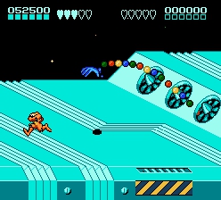 Battle Toads And Double Dragon screenshot where a creepy hand made out of balls is stretching menaciningly towards our terrified toad