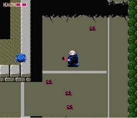 Fester's Quest screenshot of creepy Uncle Fester cleaning up the mean steets of monsters and such