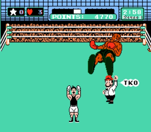 Mike Tyson's Punch Out screenshot where scrawny child Lil Mac just easilly whooped up on the great Mike Tyson while Mario refs the match
