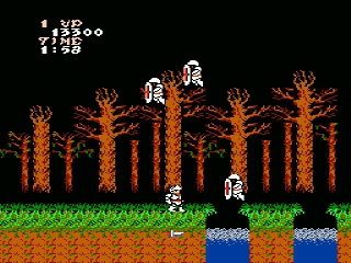 Ghosts N Goblins screenshot where our armor clad hero throws knives at flying ghost creatures