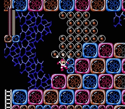 Mega Man 3 screenshot where Mega Man shoots weird egg bubble things underwater