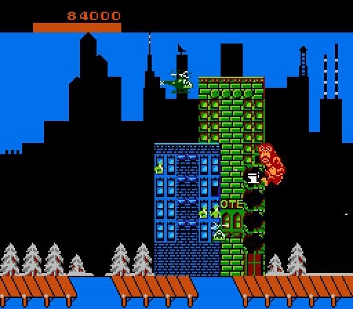 Rampage screenshot where our King Kong ripoff giant gorilla is climing a sky scraper to punch holes in it and eat the delicious toilet found within