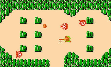 Zelda screenshot with the classic top down view of Link stabbing poor innocent octopus like land creatures who only want to shoot Link with stones from their adorable octopus snouts